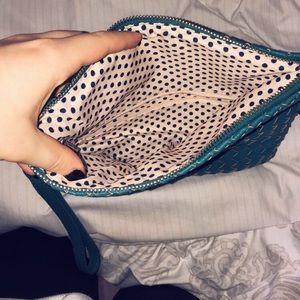 Francesca’s woven clutch